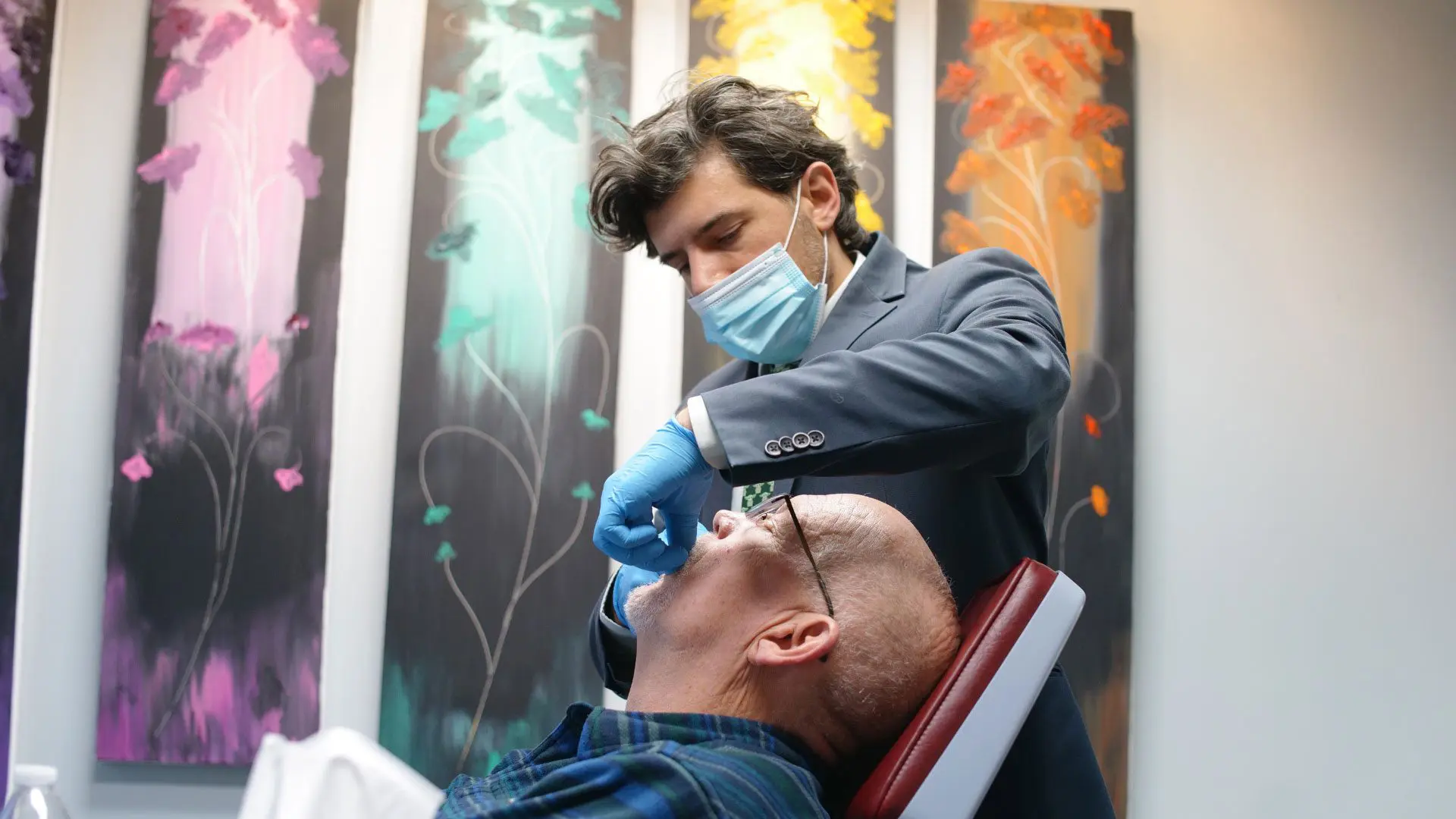 Dr. Daia with a patient and finding the right Comprehensive Orthodontics treatment plan.