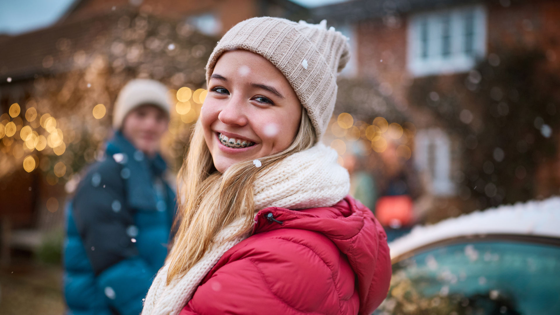 A child smiling with braces and a maxillary skeletal expander provided by Dr, Daia. A inter orthodontic treatment in Rochester hills.